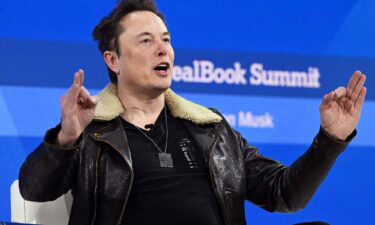 Elon Musk speaks onstage during The New York Times Dealbook Summit 2023 on November 29