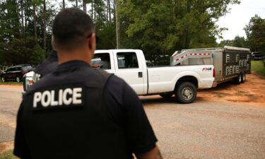 A dog transport is seen arriving at a property following a raid related to dog fighting in Prosperity