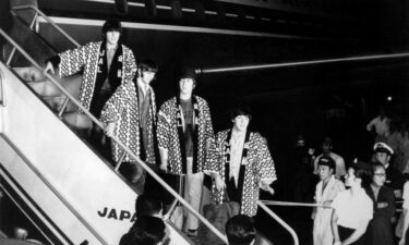 The Beatles arrive at Tokyo's airport for their brief tour of Japan in 1966.