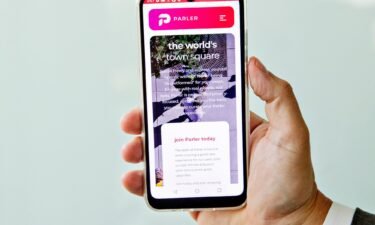 This August 2021 photo shows a Freedom Phone showing the Parler app in Orem