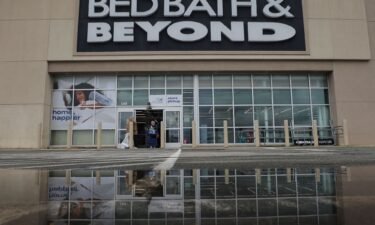 Shoppers leave a Bed Bath & Beyond store