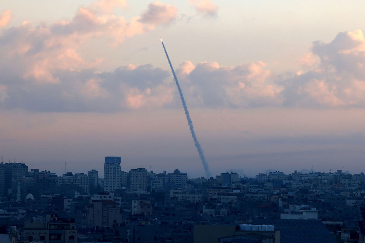 <i>Mahmud Hams/AFP/Getty Images</i><br/>Rockets are fired from Gaza City towards Israel during the October 7 attacks.