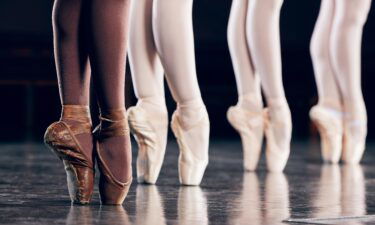 A ballerina performs in a shoe that has been "pancaked