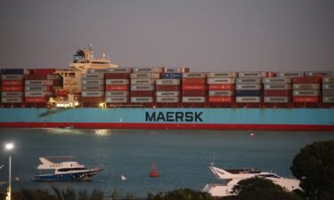The Maersk Sentosa container ship sails southbound to exit the Suez Canal in Suez