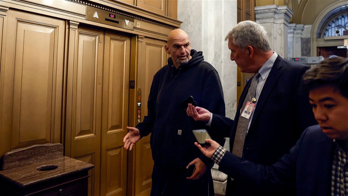 <i>Anna Moneymaker/Getty Images</i><br/>Sen. John Fetterman arrives at the Capitol on April 17 in Washington