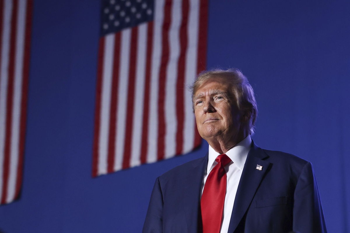 <i>Reba Saldanha/AP</i><br/>Donald Trump greets the crowd at a campaign rally on December 16 in Durham.