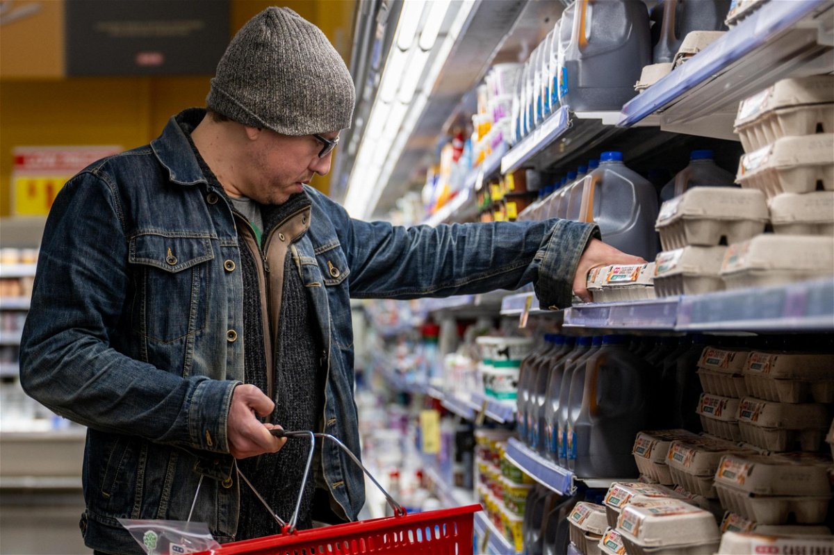 <i>Brandon Bell/Getty Images</i><br/>A customer shops for eggs at a H-E-B grocery store on February 08