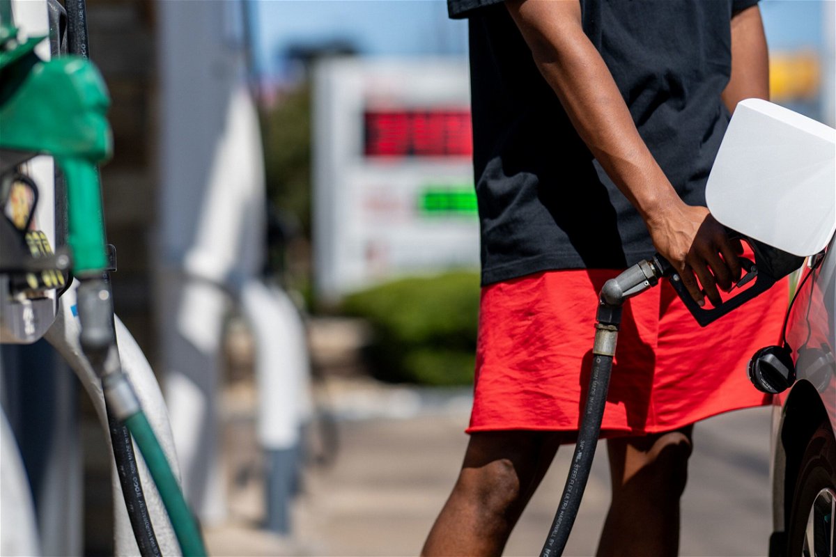<i>Brandon Bell/Getty Images</i><br/>A person pumps gas at a Shell gas station on August 3