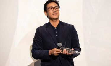 Actor Lee Sun Kyun receives the award for "Excellent Achievement in Film" during the introduction of the "Killing Romance" Midwest premiere  on October 07