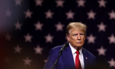 Republican presidential candidate former President Donald Trump delivers remarks during a campaign rally on December 17