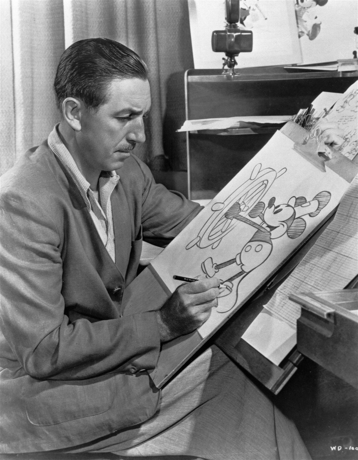 <i>Photo 12/Alamy Stock Photo</i><br/>American animator and producer Walt Disney is pictured drawing Mickey Mouse Steamboat Willie Ca 1943.  The early version of Disney’s Mickey Mouse will enter the public domain on January 1
