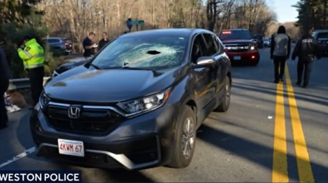 <i></i><br/>A Massachusetts driver was injured when a piece of metal crashed through her windshield and hit her in the head