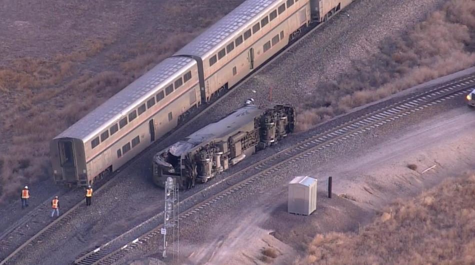 <i></i><br/>Three people were injured when an Amtrak train hit a semi hauling milk and derails in Northern Colorado.