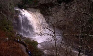 Many people braved the weather on January 9 to see Looking Glass Falls after several inches of rain fell across the area