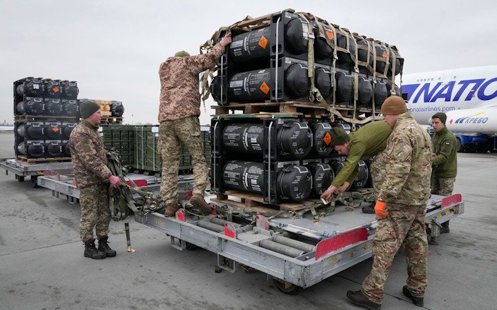 In this February 2022 photo, Ukrainian servicemen unpack Javelin anti-tank missiles, delivered as part of the United States of America's security assistance to Ukraine, at the Boryspil airport, outside Kyiv.