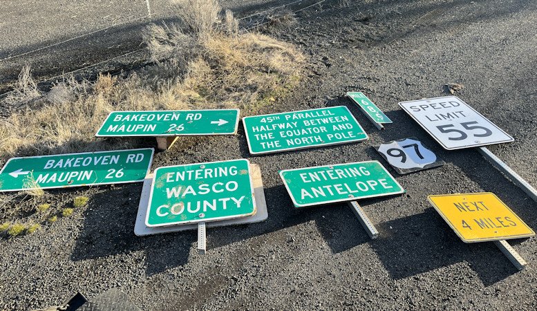 Cut-down road signs were found discarded along Oregon Highway 293 in Wasco County