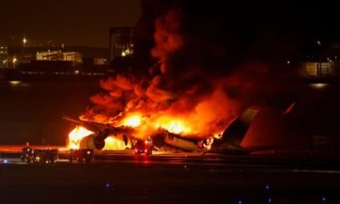 A Japan Airlines A350 airplane on fire at Haneda international airport in Tokyo.