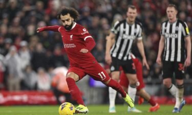 Salah takes a penalty against Newcastle.