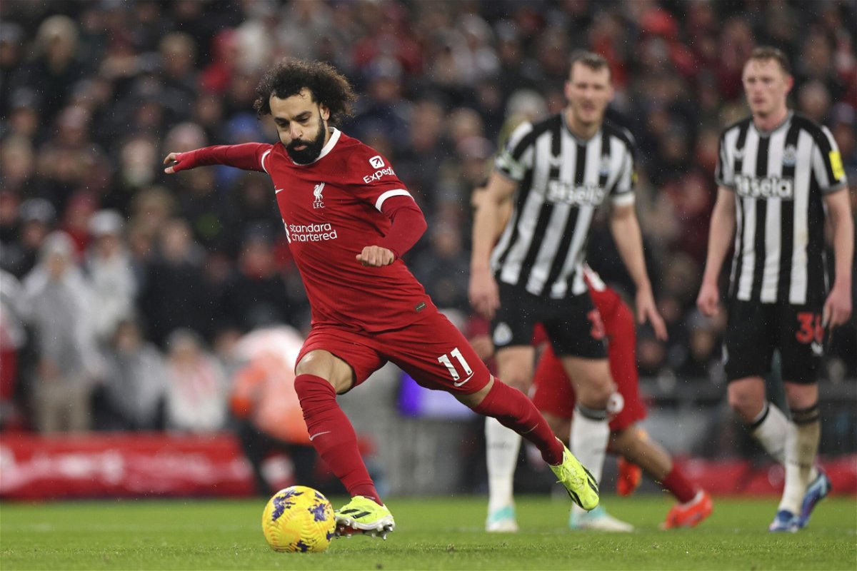 <i>Jan Kruger/Getty Images</i><br/>Salah takes a penalty against Newcastle.