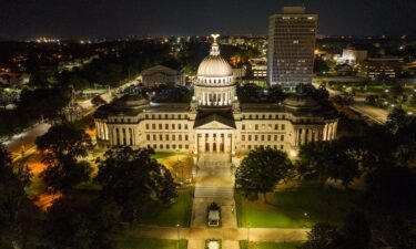 The Mississippi State Capitol is illuminated in Jackson in September 2022.  A federal court of appeals has delayed the creation of a state-run court system in Jackson.