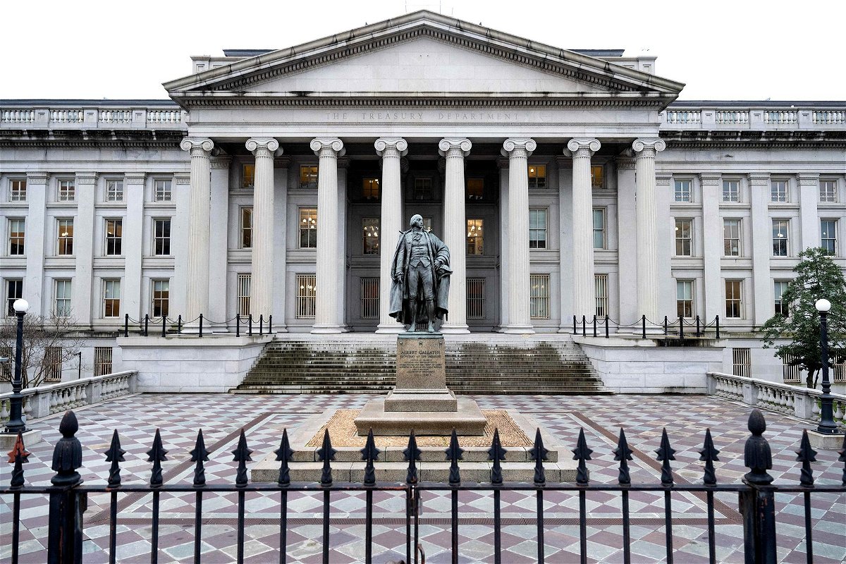 <i>Saul Loeb/AFP/Getty Images</i><br/>The US Treasury Department said national debt surpassed $34 trillion on December 29.