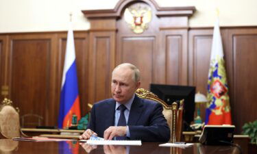 Russia's President Vladimir Putin attends a meeting in Moscow on December 28