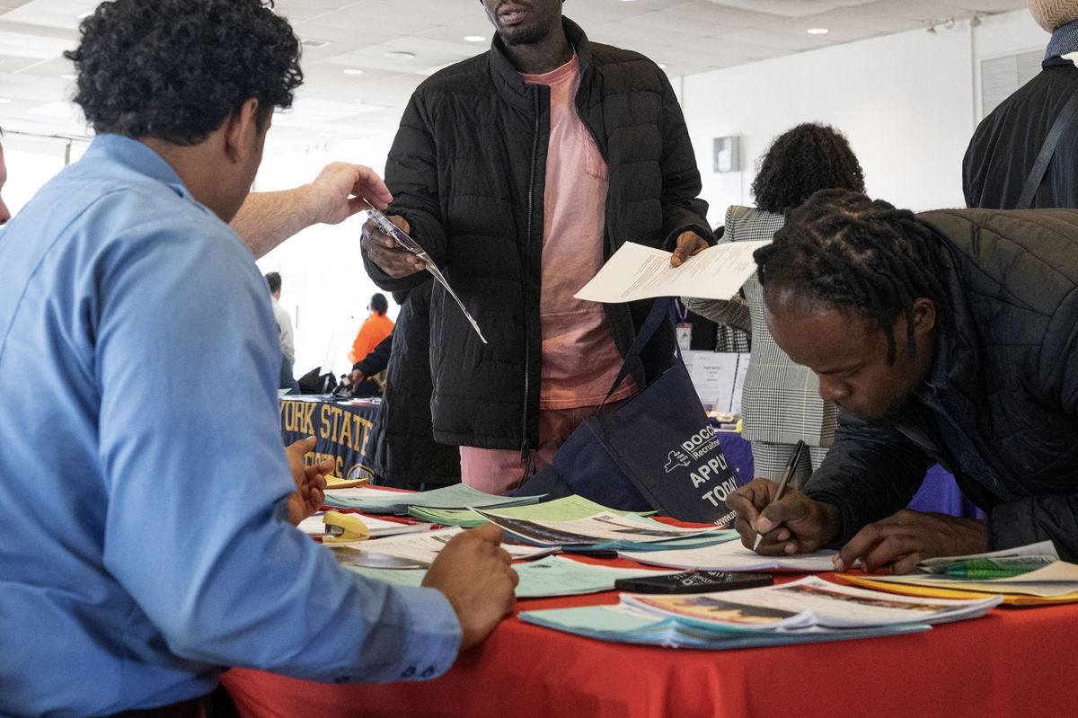 <i>Victor J. Blue/Bloomberg/Getty Images</i><br/>Jobseekers attend the Civil Service Career Fair at the Bronx Community College in New York on Tuesday