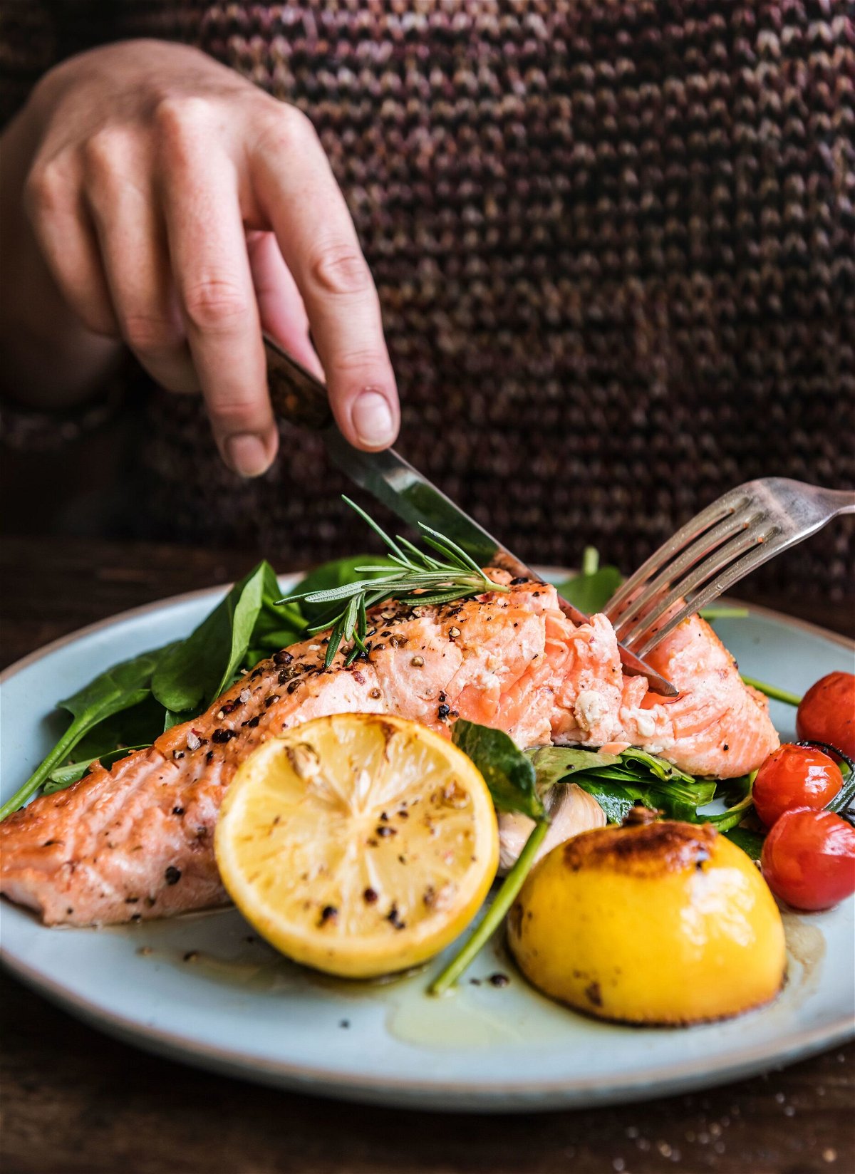 <i>Rawpixel/iStockphoto/Getty Images</i><br/>A serving of fish such as salmon can be key to lowering the risk for heart disease due to its high content of healthy omega-3 fatty acids.