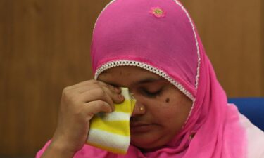 Indian rape survivor Bilkis Bano reacts during a press conference in New Delhi in May 2017. Bano was gang raped and seven of her relatives were killed during religious riots that broke out in the western state of Gujarat in 2002.