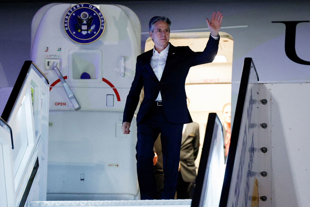 <i>Evelyn Hockstein/Pool/Getty Images</i><br/>US Secretary of State Antony Blinken waves as he departs from al-Ula in northwestern Saudi Arabia for Tel Aviv on January 8