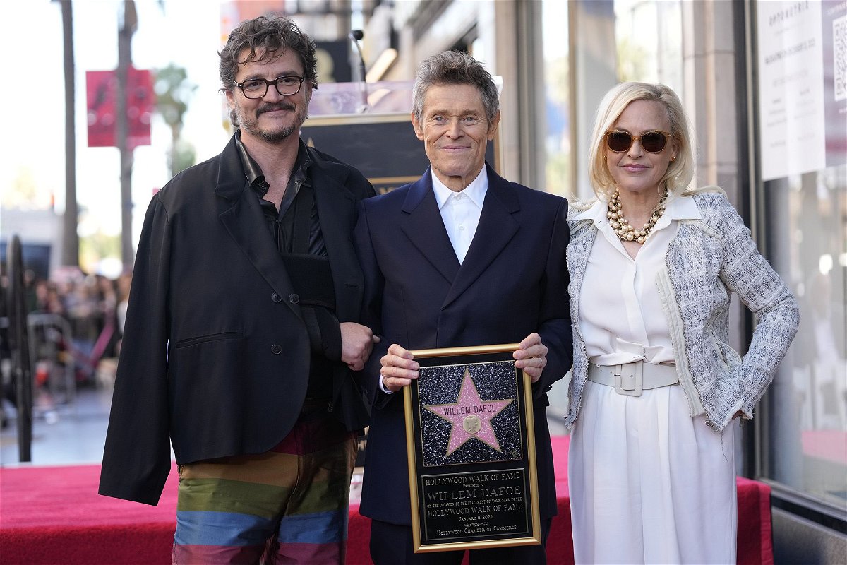 <i>Mario Anzuoni/Reuters</i><br/>Willem Dafoe unveils his star on the Hollywood Walk of Fame.