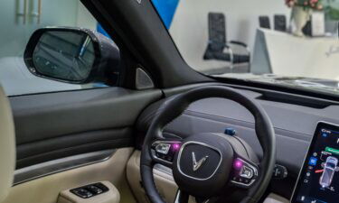 The steering wheel and the dashboard of VVinFast Auto Ltd. electric vehicle VF5 model on display inside the company's showroom in Hanoi