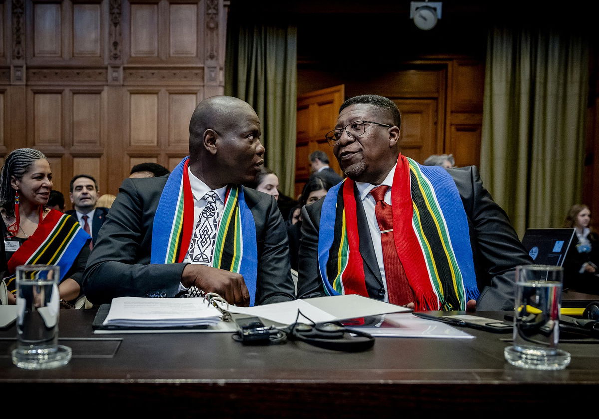 <i>Thilo Schmuelgen/Reuters</i><br/>People sit inside the International Court of Justice (ICJ) on the day of the trial to hear a request for emergency measures by South Africa