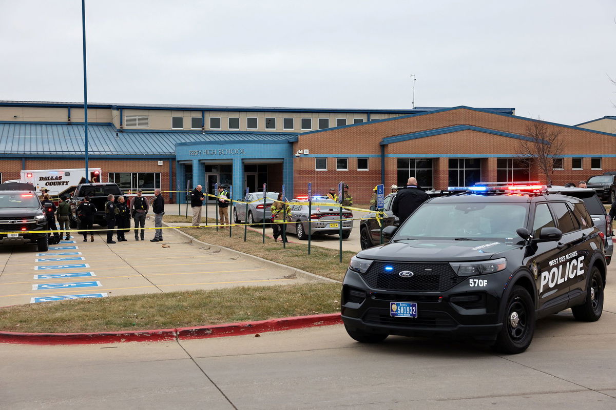 <i>Scott Morgan/Reuters</i><br/>Law enforcement officers work at the scene of a shooting at Perry High School in Perry