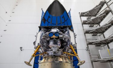 Astrobotic Technology's Peregrine lunar lander is seen being encapsulated in the nose cone of United Launch Alliance's Vulcan rocket.