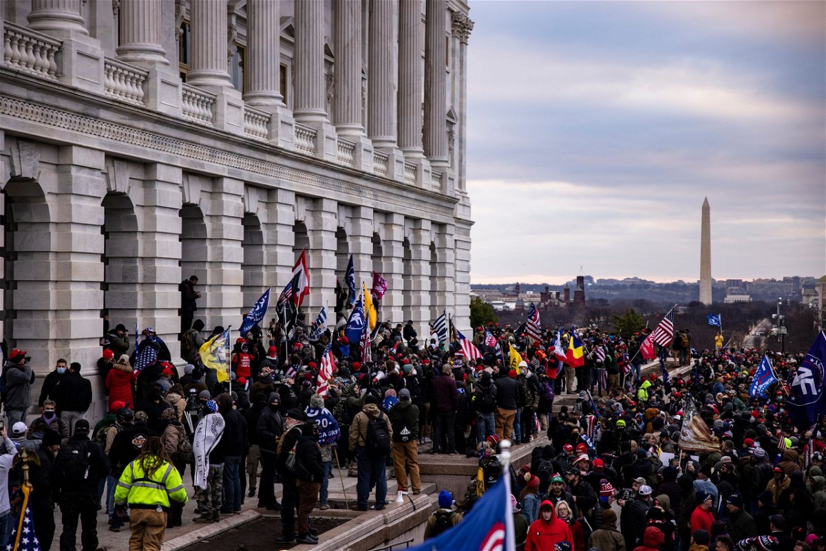 <i>Samuel Corum/Getty Images</i><br/>A pro-Trump mob storms the US Capitol following a rally with President Donald Trump on January 6