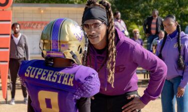 Snoop Dogg and Tika Sumpter (background right) in the comedy "The Underdoggs."