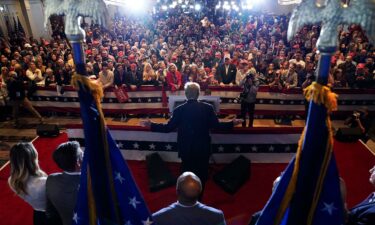 Former president Donald Trump speaks after he was projected to be the New Hampshire primary winner during a watch party on Tuesday