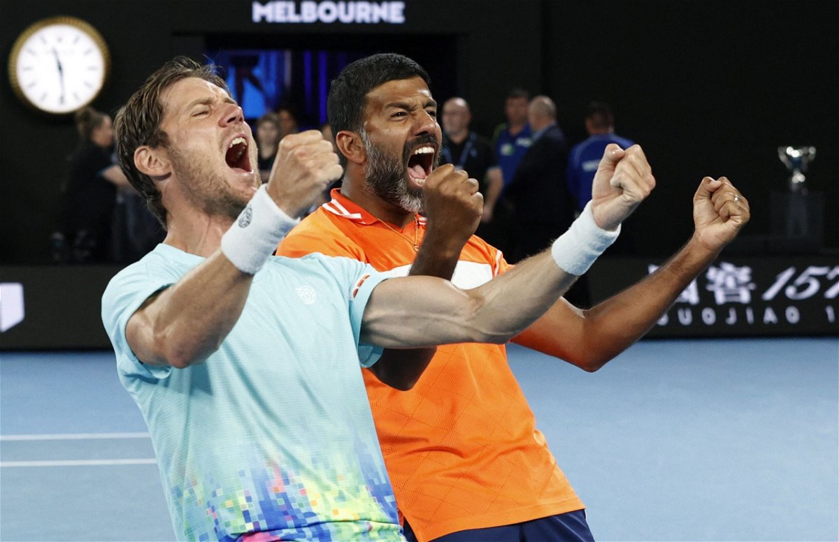 <i>Ciro De Luca/Reuters</i><br/>Rohan Bopanna and Matthew Ebden celebrate winning the men's doubles final at the Australian Open.