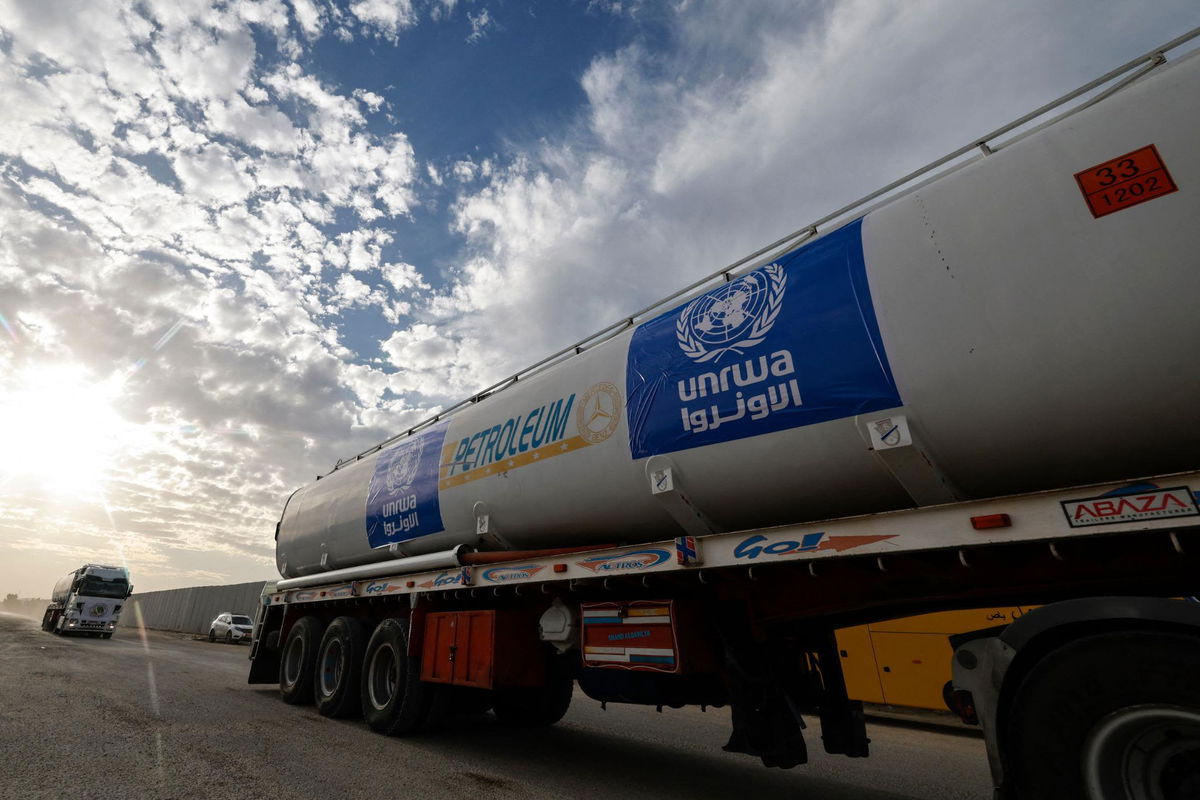 <i>Khaled Desouki/AFP/Getty Images</i><br/>Trucks of the United Nations Relief and Works Agency for Palestine Refugees (UNRWA) carrying fuel arrive at the Egyptian side of the Rafah border crossing with the Gaza Strip on November 22