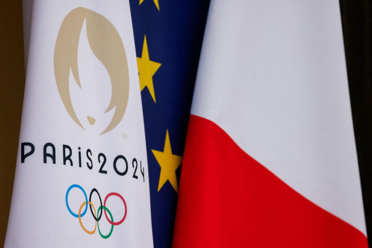 <i>Ludovic Marin/AFP/Getty Images</i><br/>This Paris 2024 Olympic Games flag next to European Union and French flag at the presidential Elysee Palace in Paris in 2024.