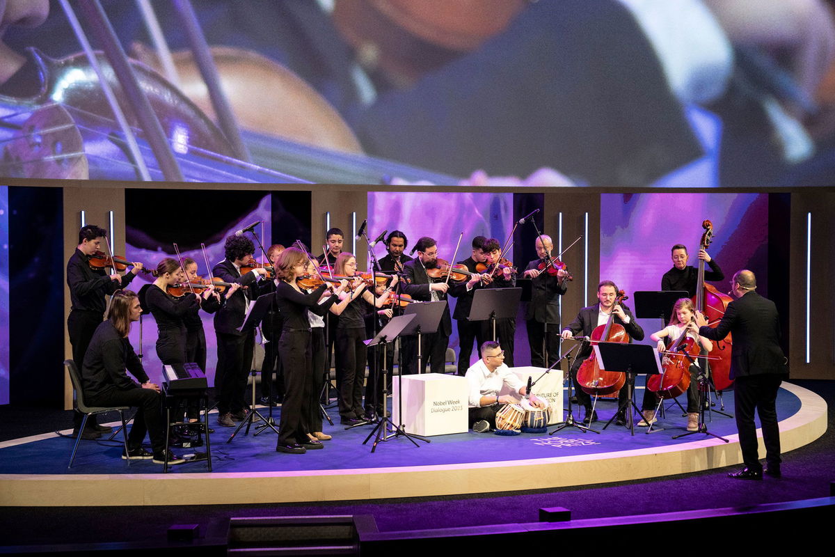 <i>Courtesy Emelie Asplund/Dream Orchestra</i><br/>The Dream Orchestra performs at a church in Gothenburg. Álvarez says holding frequent concerts and setting goals has helped inspire his students.