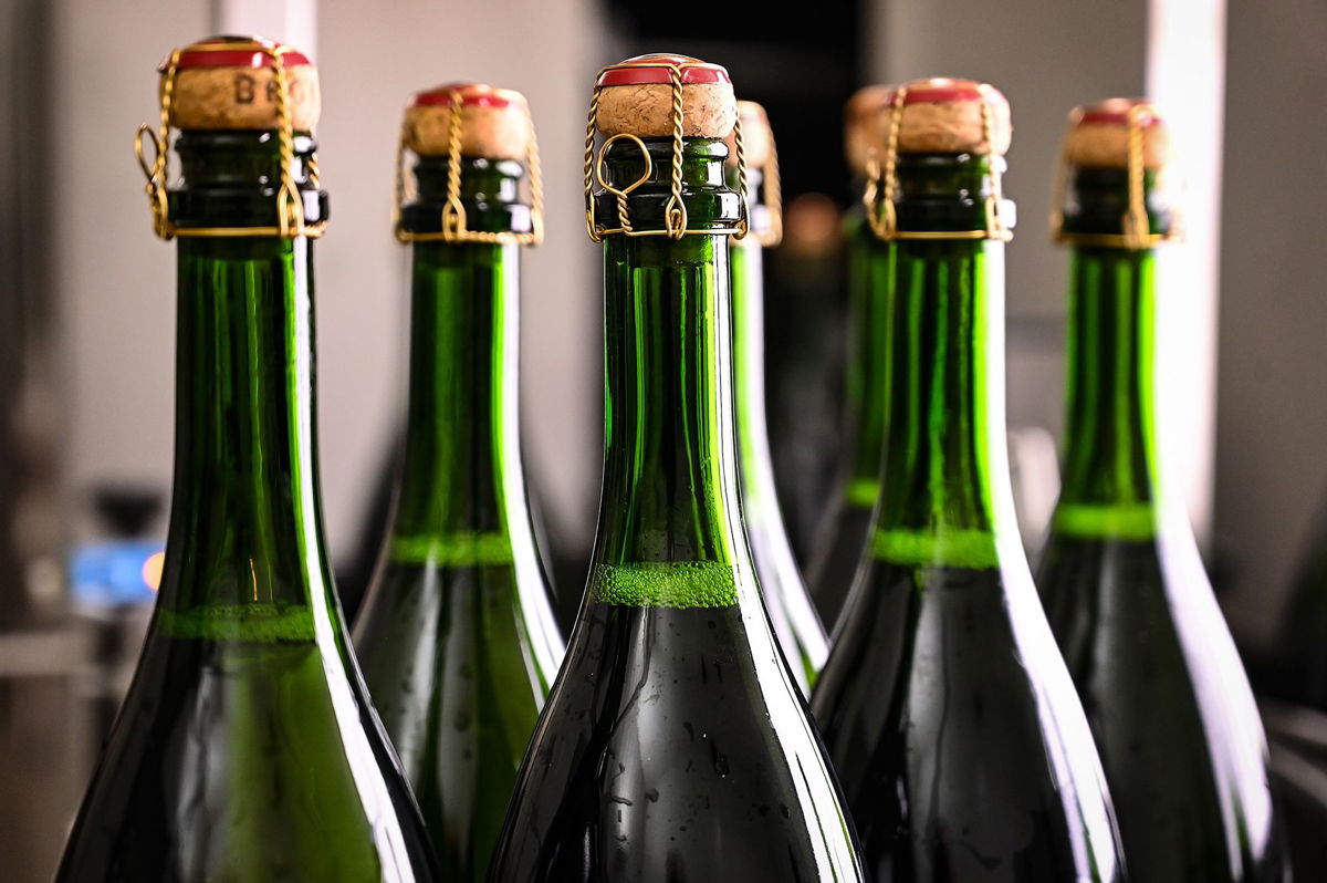 <i>Bertrand Guay/AFP/Getty Images</i><br/>Champagne sales have lost some of their pop in 2023.