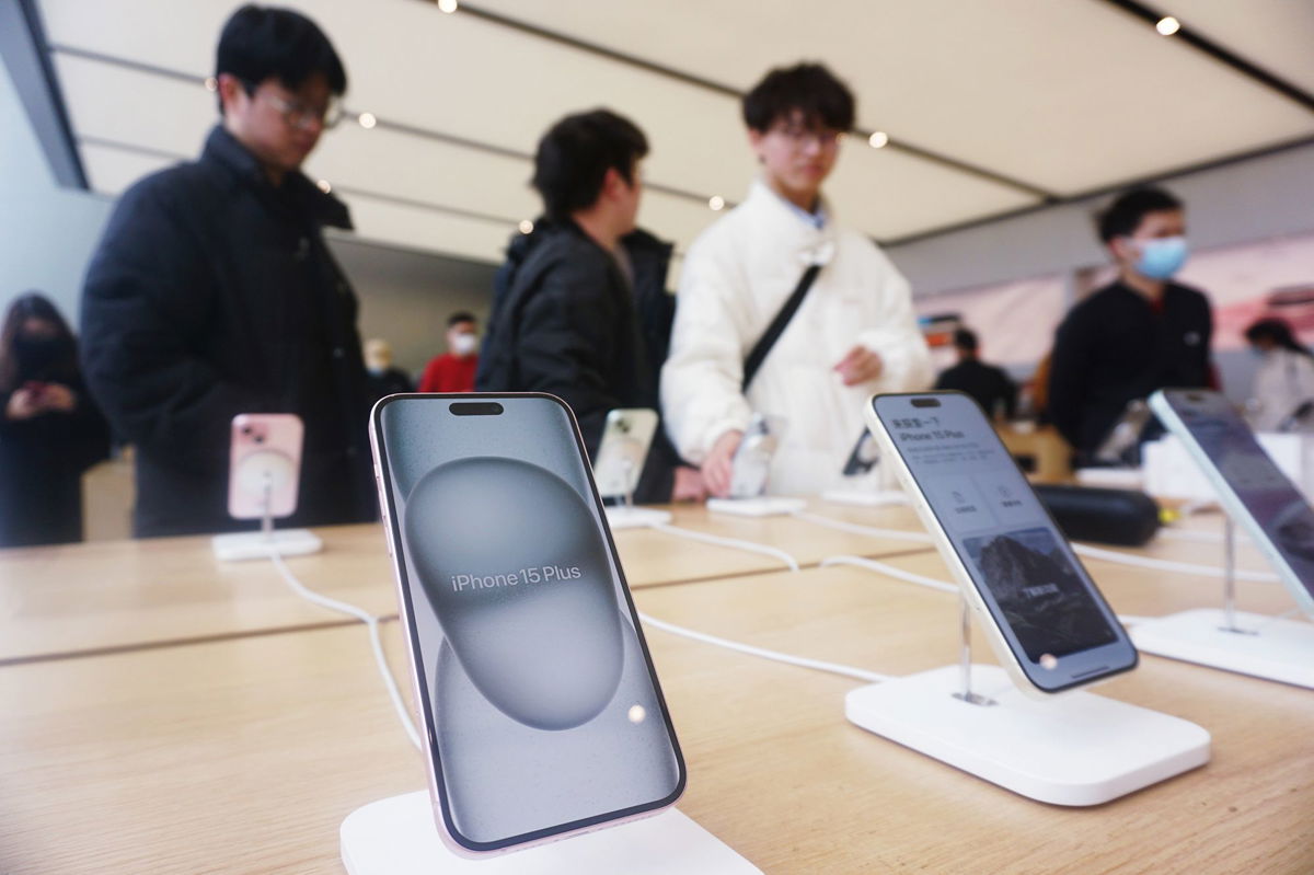 <i>CFOTO/Future Publishing/Getty Images</i><br/>Customers experience the iPhone15 series at Apple's flagship store in Hangzhou