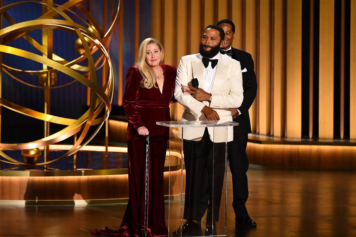 <i>Valerie Macon/AFP/Getty Images</i><br/>(From left) Christina Applegate and  Anthony Anderson at the 75th Emmy Awards in Los Angeles.