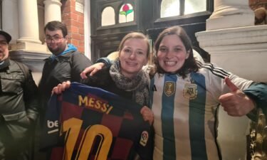 Johanne Perraud (L) and Romina Polenta (R) stood in a huddle of fans hoping to catch a glimpse of Lionel Messi