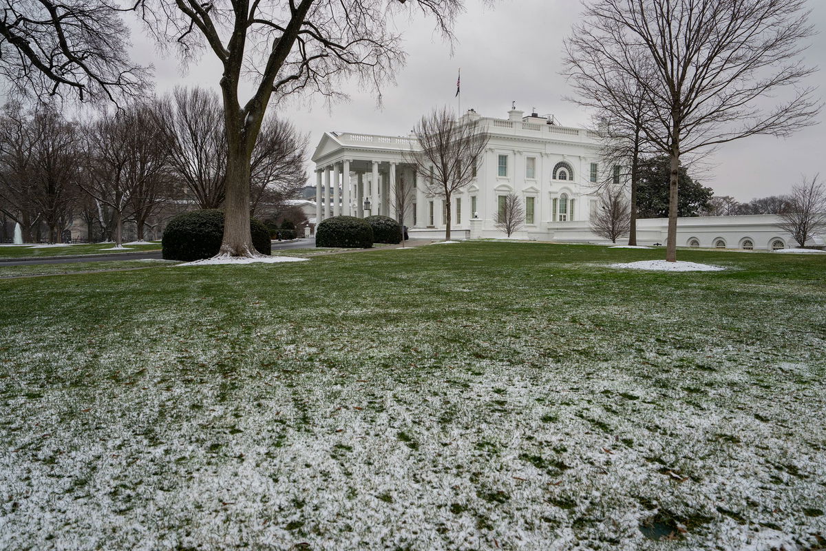 <i>Ken Cedeno/Sipa/AP</i><br/>The White House is seen under a dusting of snow January 15 in Washington DC. Congressional leaders have been invited to the White House to meet with President Joe Biden about the future of a supplemental spending bill