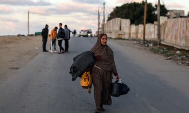 Citizens wait for food in Rafah in southern Gaza. Officials reported that nearly all families in Gaza are skipping meals due to food shortages.