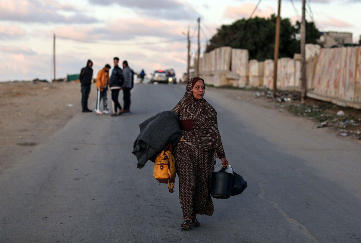 <i>Ahmad Hasaballah/Getty Images</i><br/>Citizens wait for food in Rafah in southern Gaza. Officials reported that nearly all families in Gaza are skipping meals due to food shortages.