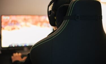 Playing video games at excessive sound levels has been associated with hearing loss